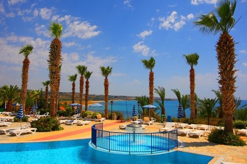 Pool side at Ascos Coral Beach in Paphos, Cyprus. Travel with World Lifetime Journeys