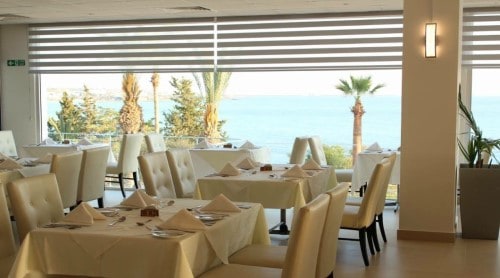 Restaurant at Ascos Coral Beach in Paphos, Cyprus. Travel with World Lifetime Journeys