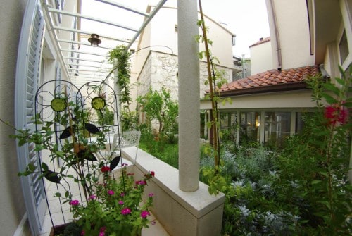 Beautiful garden at Hotel Croatia in Baska Voda, Croatia. Travel with World Lifetime Journeys