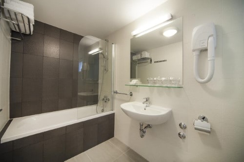 Ensuite bathroom at Bluesun Hotel Neptun near Makarska, Croatia. Travel with World Lifetime Journeys