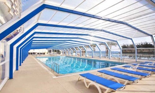 Interior pool at Poseidonia Beach Hotel in Limassol, Cyprus. Travel with World Lifetime Journeys