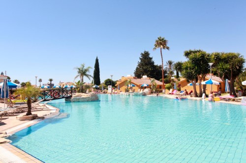 Pool side at Makronisos Holiday Village in Ayia Napa, Cyprus. Travel with World Lifetime Journeys