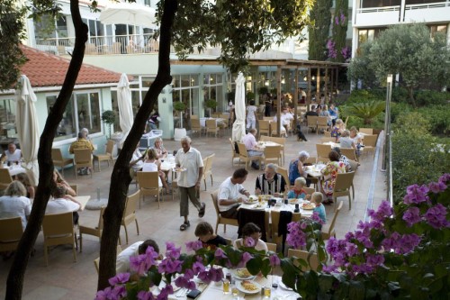 Outside terrace at Valamar Club Dubrovnik Hotel in Dubrovnik, Croatia. Travel with World Lifetime Journeys