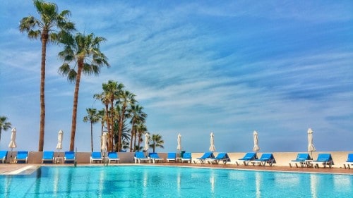 Pool view at Cynthiana Beach Hotel in Paphos, Cyprus. Travel with World Lifetime Journeys