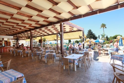 Terrace view at Makronisos Holiday Village in Ayia Napa, Cyprus. Travel with World Lifetime Journeys