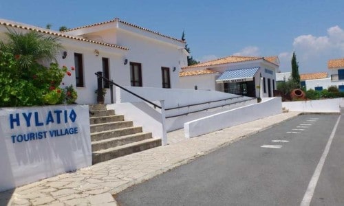 Main entrance at Hylatio Tourist Village in Limassol, Cyprus. Travel with World Lifetime Journeys