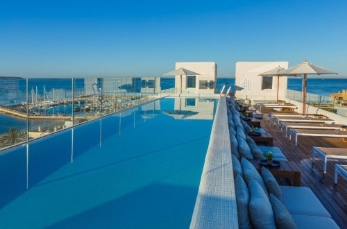 Pool area at HM Alma Beach in Palma de Mallorca. Travel with World Lifetime Journeys