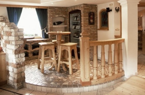 Bar area at Garni Bracun Hotel in Corvara, Italy. Travel with World Lifetime Journeys