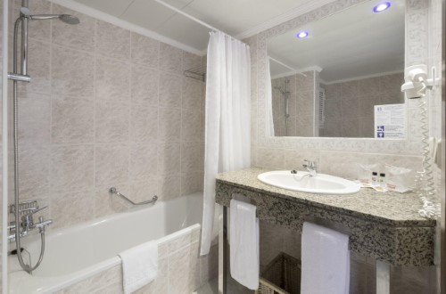 Ensuite bathroom at Azuline Hotel Coral Beach in Es Canar, Ibiza. Travel with World Lifetime Journeys