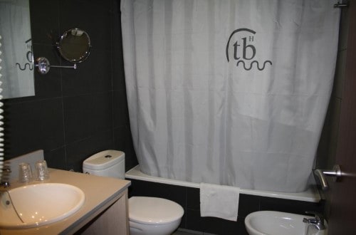 Bathroom at Hotel Tossa Beach Center in Tossa de Mar, Spain. Travel with World Lifetime Journeys