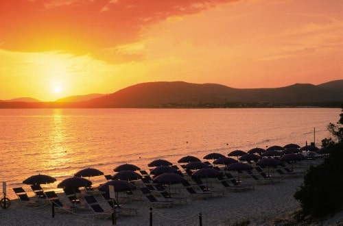 Beach front at Angedras Hotel in Alghero, Sardinia. Travel with World Lifetime Journeys