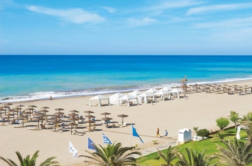 Beach front at Grecotel Creta Palace in Rethymno, Crete. Travel with World Lifetime Journeys