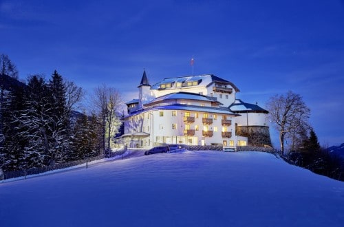 Beautiful night view at Schloss Mittersill Hotel in Kitzbühel, Austria. Travel with World Lifetime Journeys