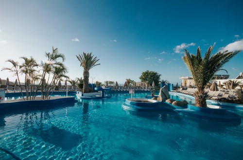 Beautiful pool at Servatur Puerto Azul Hotel in Puerto Rico, Gran Canaria. Travel with World Lifetime Journeys