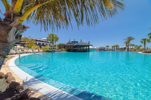 Pool side at H10 Rubicon Palace in Playa Blanca, Lanzarote. Travel with World Lifetime Journeys