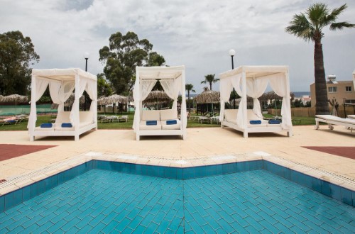 Pool side at Adelais Bay Hotel in Protaras, Cyprus. Travel with World Lifetime Journeys