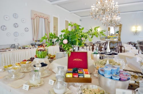 Breakfast room at The Palace Hotel in Viareggio, Italy. Travel with World Lifetime Journeys