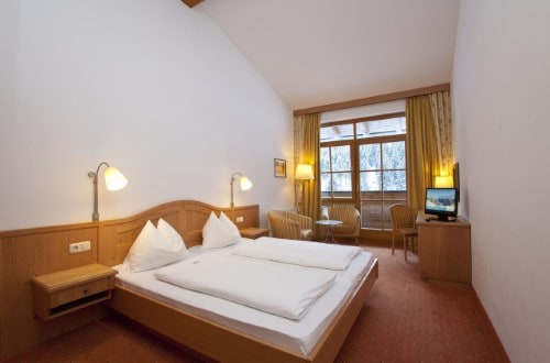 Classic room at Alpine Resort Zell am See in Austria. Travel with World Lifetime Journeys