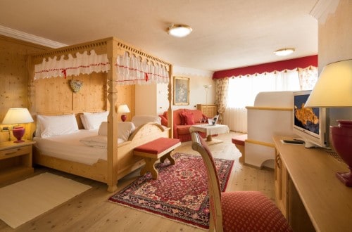 Deluxe room at Hotel Sassongher  in Corvara, Italy. Travel with World Lifetime Journeys