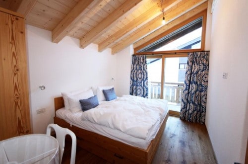 Double room at Allalin Apartments in Saas Fee, Switzerland. Travel with World Lifetime Journeys