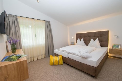 Double room at Alpine Resort Zell am See in Austria. Travel with World Lifetime Journeys