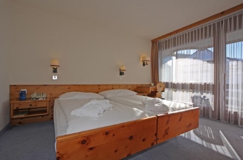 Double room at Central Sporthotel in Davos, Switzerland. Travel with World Lifetime Journeys