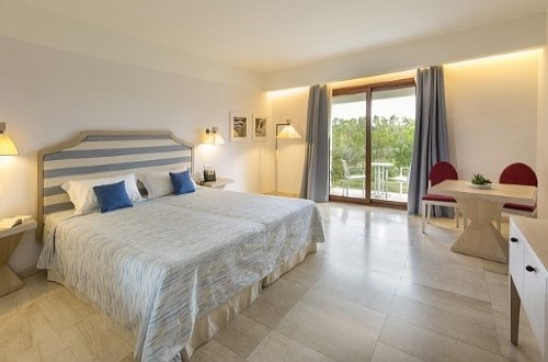 Double room at Grand Baia Resort in San Teodoro, Sardinia. Travel with World Lifetime Journeys