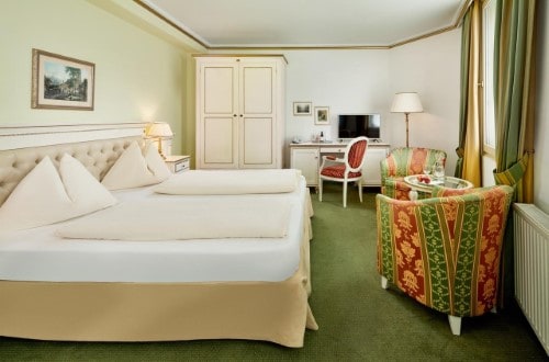 Double room at Grand Hotel in Zell am See, Austria. Travel with World Lifetime Journeys