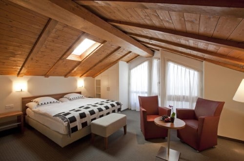 Double room at Hotel Allalin in Saas Fee, Switzerland. Travel with World Lifetime Journeys