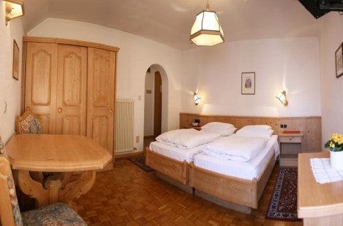 Double room at Hotel Dolomiti Madonna in Ortisei, Italy. Travel with World Lifetime Journeys