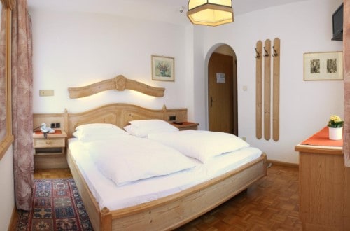 Double room at Hotel Dolomiti Madonna in Ortisei, Italy. Travel with World Lifetime Journeys