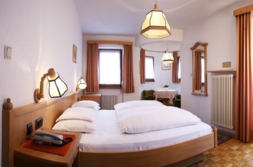 Double room at Hotel Dolomiti Madonna in Ortisei, Italy. Travel with World Lifetime Journeys