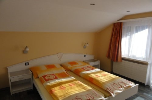 Double room at Hotel Europa in Saas Fee, Switzerland. Travel with World Lifetime Journeys