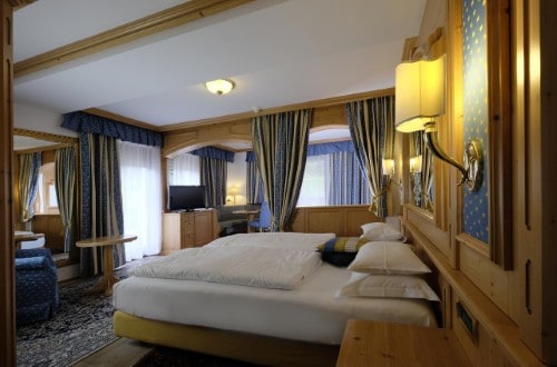 Double room at Hotel Evaldo in Arabba, Italy. Travel with World Lifetime Journeys