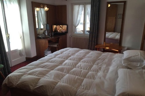 Double room at Hotel Majoni in Cortina D’Ampezzo, Italy. Travel with World Lifetime Journeys