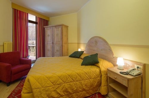 Double room at Hotel Portavescovo in Arabba, Italy. Travel with World Lifetime Journeys