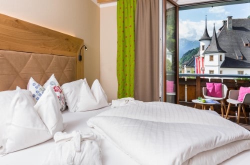 Double room at Hotel Zum Hirschen in Zell am See, Austria. Travel with World Lifetime Journeys