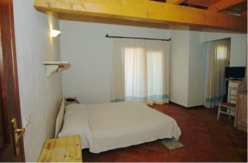 Double room at Liscia Eldi Resort in San Teodoro, Sardinia. Travel with World Lifetime Journeys