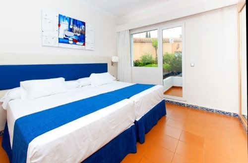 Double room at Marbella Playa Hotel in Marbella, Spain. Travel with World Lifetime Journeys