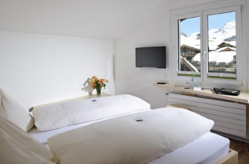 Double room at Park Hotel in Saas Fee, Switzerland. Travel with World Lifetime Journeys