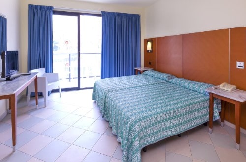 Double room at Port Fiesta Park in Benidorm, Spain. Travel with World Lifetime Journeys