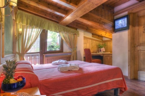 Double room at Sport Hotel Barisetti in Cortina D’Ampezzo, Italy. Travel with World Lifetime Journeys