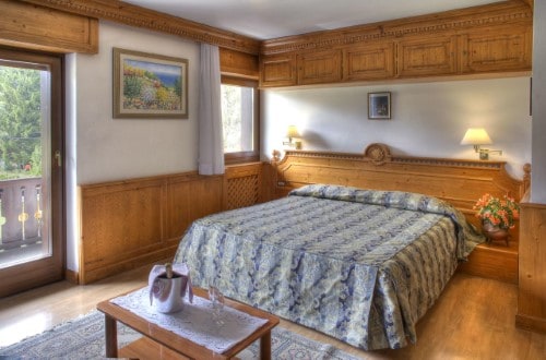 Double room at Sport Hotel Barisetti in Cortina D’Ampezzo, Italy. Travel with World Lifetime Journeys