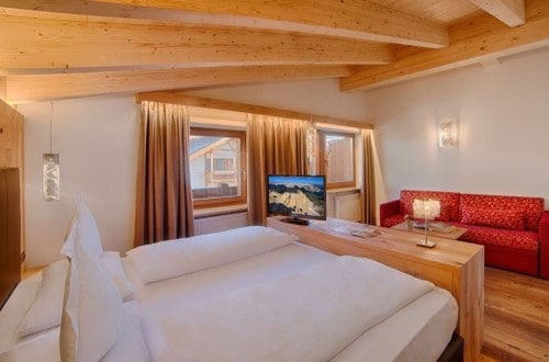 Double room at Sporthotel Panorama in Corvara, Italy. Travel with World Lifetime Journeys