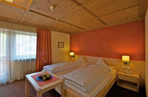 Double room at Sporthotel Panorama in Corvara, Italy. Travel with World Lifetime Journeys