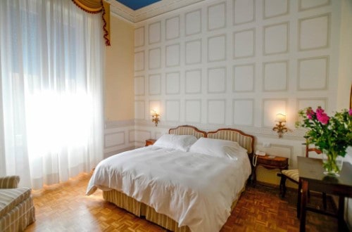 Double room at The Palace Hotel in Viareggio, Italy. Travel with World Lifetime Journeys