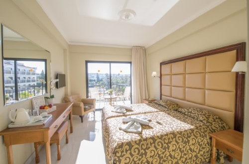 Double room at Tsokkos Gardens Hotel in Protaras, Cyprus. Travel with World Lifetime Journeys