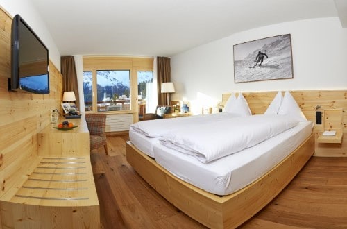 Double room at Waldhotel National Superior Hotel in Arosa, Switzerland. Travel with World Lifetime Journeys