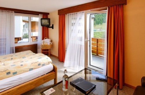 Double room with balcony in Saas Fee, Switzerland. Travel with World Lifetime Journeys