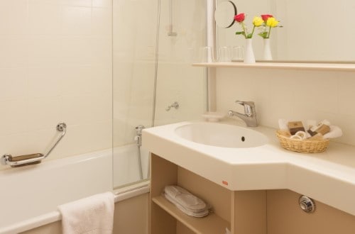 Ensuite bath at Central Sporthotel in Davos, Switzerland. Travel with World Lifetime Journeys